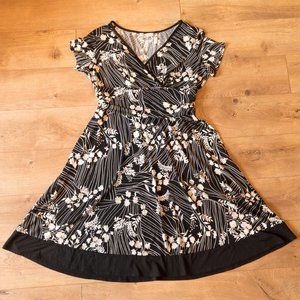 Ruched Waist black and white floral faux wrap fit and flare dress